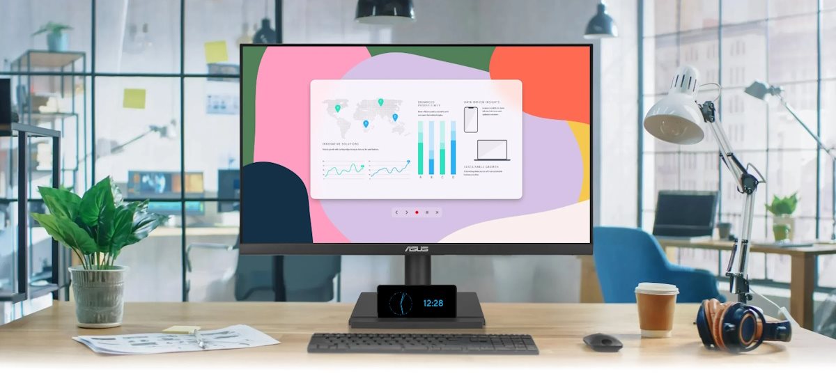 A situational image of a computer screen on the table with some business charts inside
