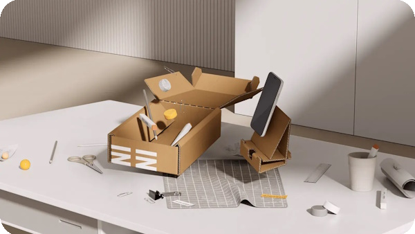 Der Karton kann Box und Telefonhalter sein